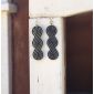 Lifestyle photo - Interposed Circular Vine wood earrings